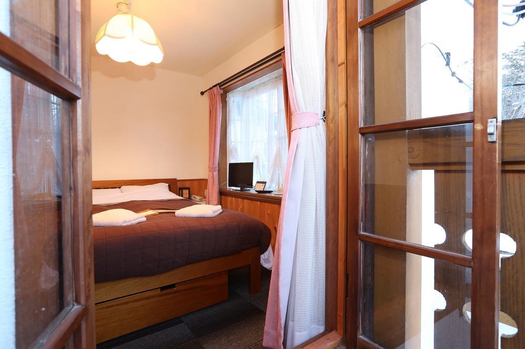 Alpine Wind Bed & Breakfast Hakuba Phòng bức ảnh